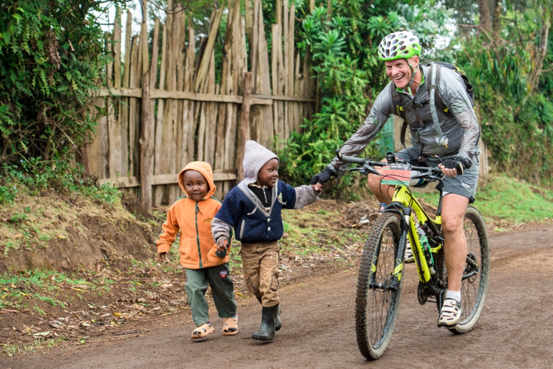 cyclist in forrest, adventure bike trails, adventure, tanzania